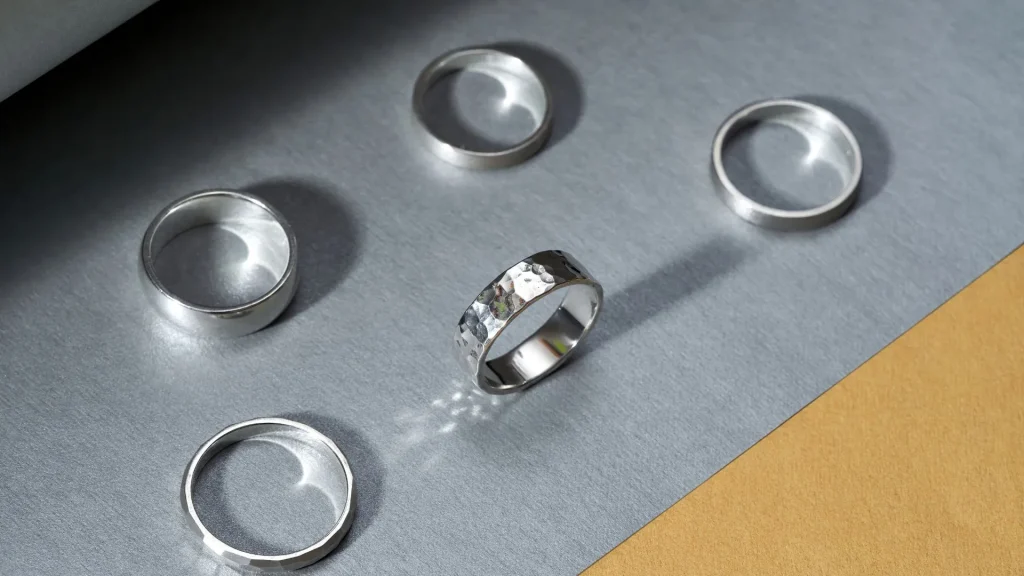 Silver rings and band on display for comparison, Sterling Silver Vs Silver-Plated